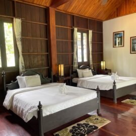 The Junior Suite Twin Room Riverside is in the Bungalow on Nam Ou River bank with Luang Prabang architectural design. The wooden room of 59 square meters is well equipped with air-conditioning, ceiling fan, safe-deposit box, free wi-fi and a private bathroom with hot and cold shower and private large balcony.